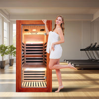 Outexer HM1 infrared sauna with a lady model beside Outexer HM1 infrared sauna with a lady model beside