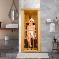 A lady enjoy sauna in the Outexer indoor sauna HY1 in the bathroom A lady enjoy sauna in the Outexer indoor sauna HY1 in the bathroom
