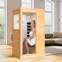 A lady enjoy her sauna in the Outexer infrared sauna T-50C at home A lady enjoy her sauna in the Outexer infrared sauna T-50C at home