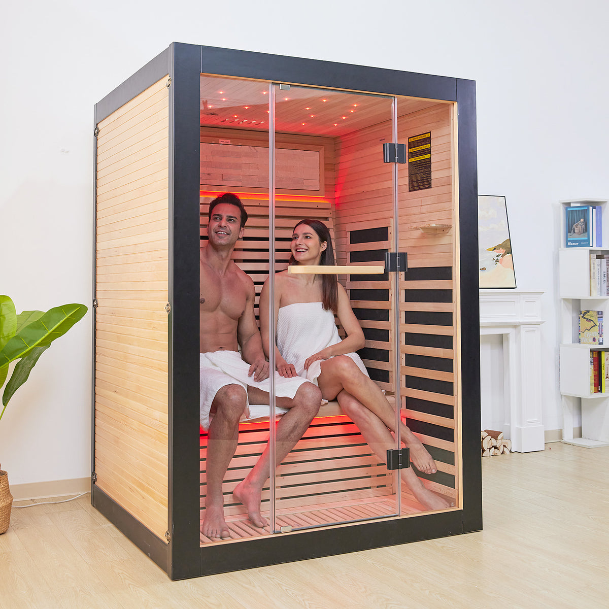 A couple sitting in the HK2 Outexer infrared sauna
