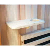 Wooden shelf attached to a wooden wall with a striped background