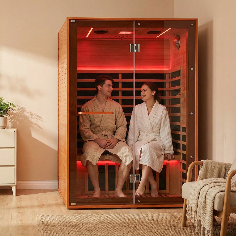 A couple sitting in a 2-person sauna