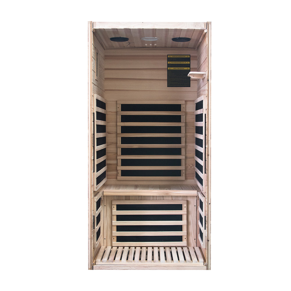Wooden sauna with black interior panels on a white background