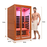 Outexer Infrared sauna with dimensions and a person standing next to it on a white background