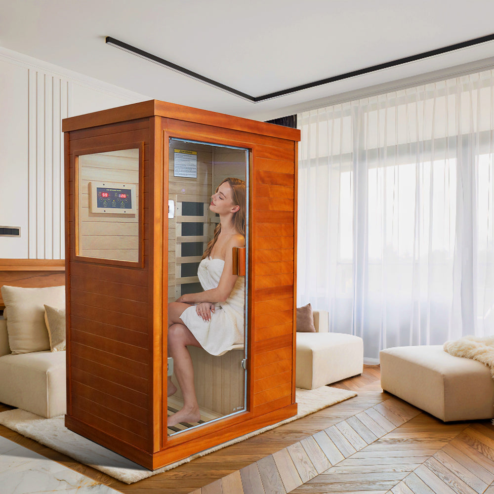 a lady enjoy her sauna in the Outexer indoor sauna T-50C3
