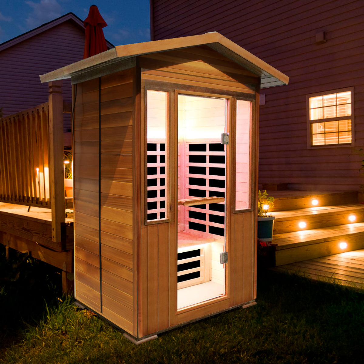 Outexer T59C3 2 person outdoor sauna lighting on in the backyard