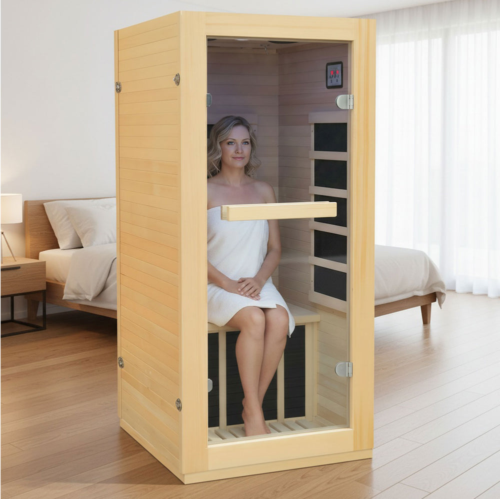 a women sit in the outexer sauna HF-MINI in the bedroom