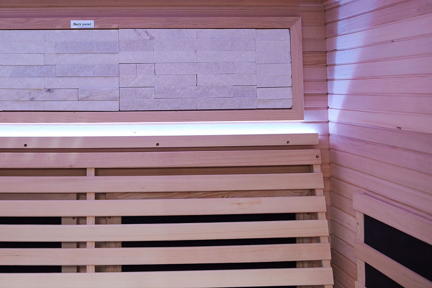 Wooden sauna bench inside a wooden sauna room