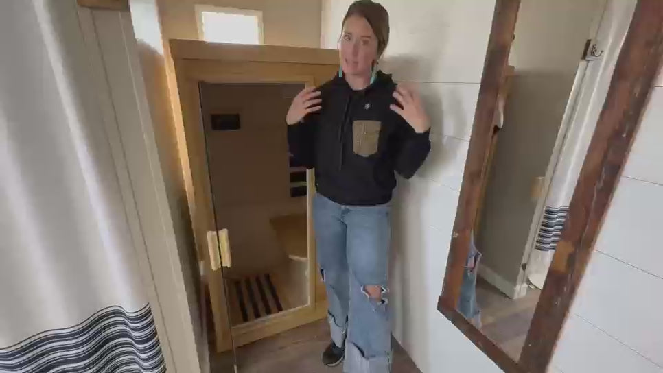 Outexer infrared sauna customer giving a walkthrough of the cabin interior and controls.