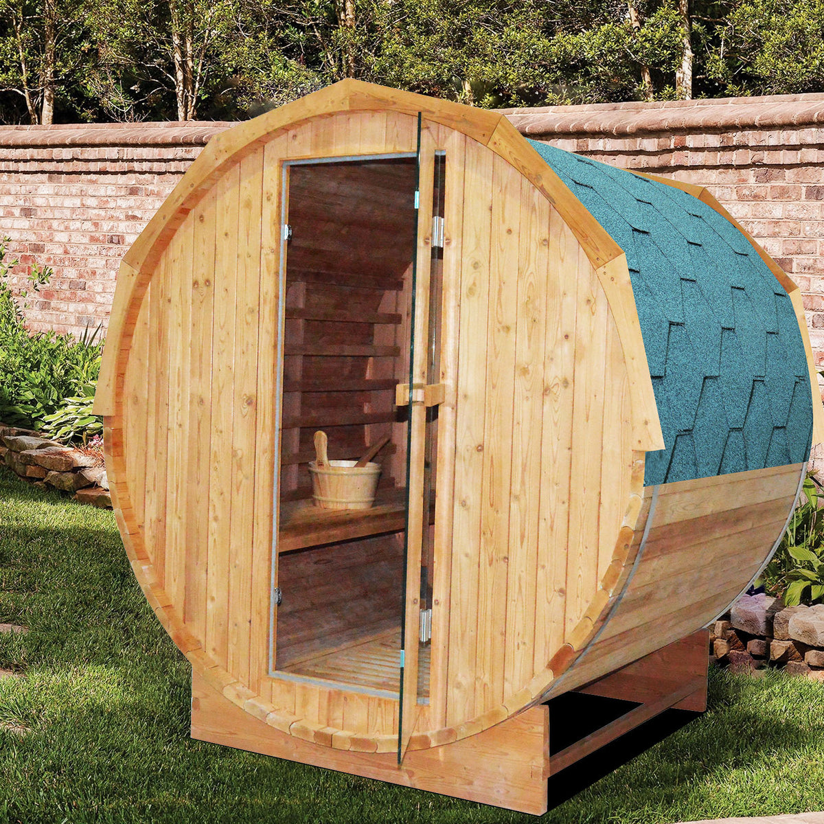Wooden outdoor barrel sauna with a glass door on a grassy area.