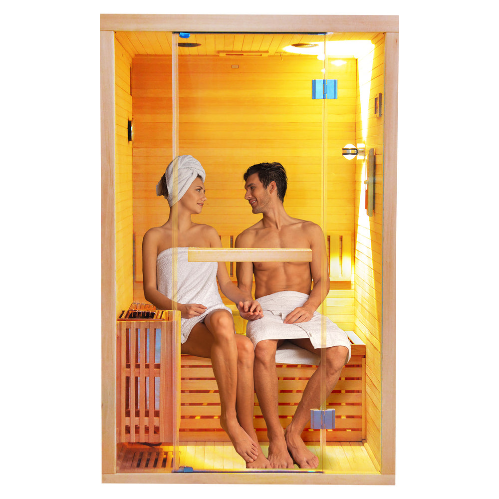 A couple sitting in a traditional sauna HY8